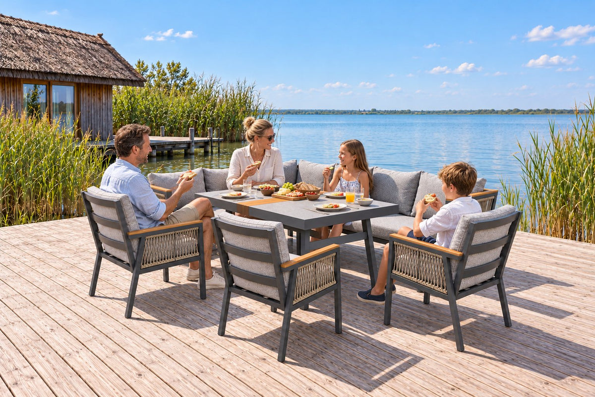 Olivia Eckbankgruppe mit anthrazitfarbenem Aluminiumgestell, hellgrau melierten Twisted-Schnüren, hellgrauen Kissen, Polywood-Tisch und drei Armstühlen